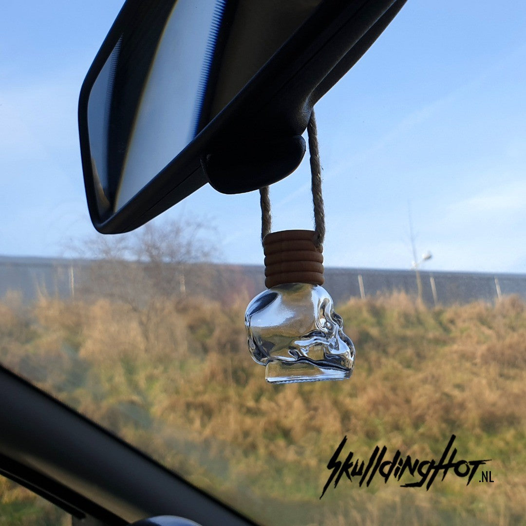 Autoparfümflaschenschädel